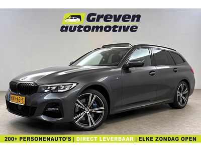 Grijs Occasion 2021 BMW 330 M Sport Stationwagen | € 34.700 (Eerlijke prijs)