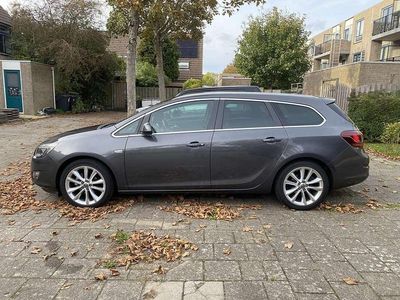 Grijs Gebruikt 2011 Opel Astra Sport Stationwagen | € 6.999 (Duur)