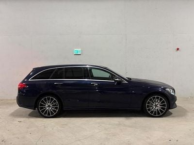 Blauw (metallic) Occasion 2015 Mercedes C350e AMG Sedan | € 17.295 (Super prijs)