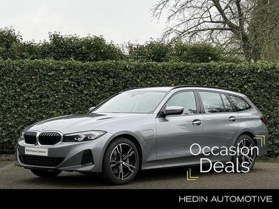 Grijs (metallic) Occasion 2023 BMW 320e Stationwagen | € 36.495 (Eerlijke prijs)