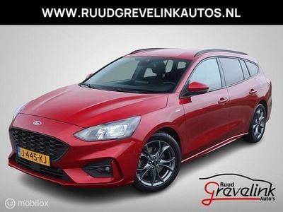 Rood (metallic) Gebruikt 2020 Ford Focus ST-Line Stationwagen | € 11.745 (Eerlijke prijs)