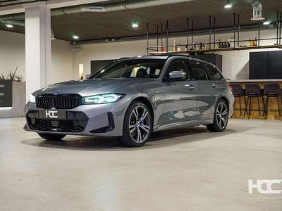 Grijs (metallic) Gebruikt 2022 BMW 330e M Sport Stationwagen | € 37.900 (Eerlijke prijs)