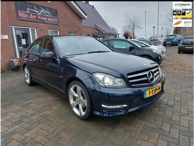 tweedehands Mercedes C180 Ambition Avantgarde. lage km stand Cruise, Navi, airco, bleutooth etc. Prijs incl garantie en rijklaar.