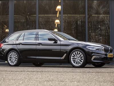Zwart (metallic) Gebruikt 2019 BMW 520 Executive Stationwagen | € 24.950 (Goede deal)