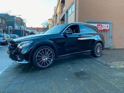 Zwart (metallic) Occasion 2018 Mercedes GLC250 AMG line SUV | € 31.750 (Duur)