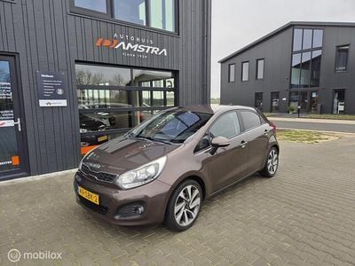 Bruin Gebruikt 2011 Kia Rio Plus Hatchback | € 5.750 (Eerlijke prijs)