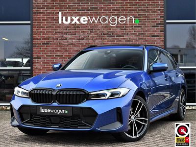 Occasion BMW 330e M Sport 292 PK (214 kW) 2022 Blauw (metallic) Stationwagen