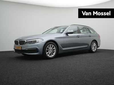 Grijs Occasion 2018 BMW 520 Executive Stationwagen | € 24.900 (Goede deal)
