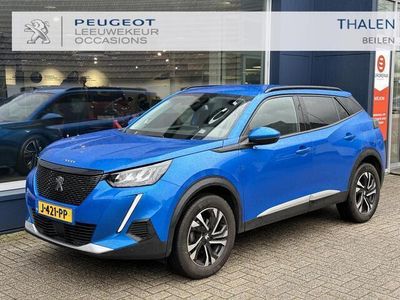 tweedehands Peugeot 2008 1.2 Turbo 130 PK Allure | Navigatie | Trekhaak 1200 KG | Keyless Start | LED Verlichting | Camera | 3D Digitaal Dashboard | Half Lederen Bekleding | 17 Inch Lichtmetalen Velgen | DAB+ Radio | GT Uitlaten | Parkeersensoren V+A | Extra Getinte