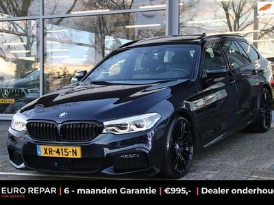 Zwart Gebruikt 2019 BMW 520 Executive Stationwagen | € 27.995 (Eerlijke prijs)