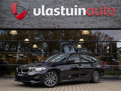 Zwart Occasion 2022 BMW 330e Executive Stationwagen | € 27.900 (Super prijs)