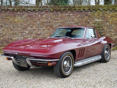 tweedehands Chevrolet Corvette C2 Coupe 427 Finished in Milano Maroon over black vinyl upholstery, Extensive frame-off restoration fully captured in photographs, Fitted with Turbine-style 15? knock-off wheels, Powered by the "big block" 427ci engine and mated to a ma