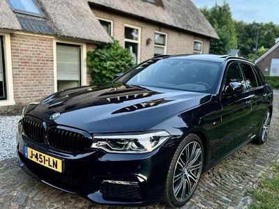 Zwart Occasion 2018 BMW 520 Executive Stationwagen | € 24.950 (Iets duurder)