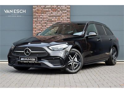 Zwart (metallic) Occasion 2022 Mercedes C300 AMG line Stationwagen | € 38.500 (Eerlijke prijs)