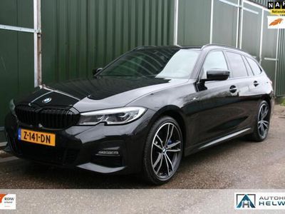 tweedehands BMW 330e 3-SERIE TouringHigh Executive M-SPORT, LEER, NAVIGATIE, 19 INCH