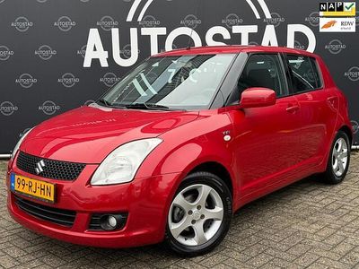 Rood (metallic) Occasion 2005 Suzuki Swift Exclusive Hatchback | € 5.995 (Eerlijke prijs)