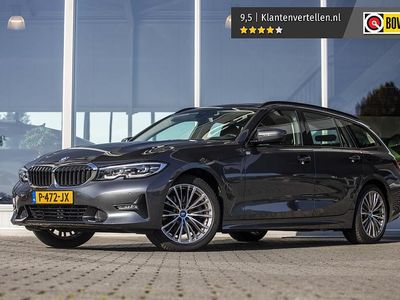 Grijs Occasion 2022 BMW 320e Stationwagen | € 32.395 (Eerlijke prijs)
