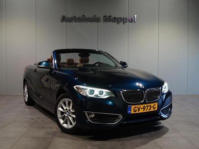 Blauw Occasion 2015 BMW 220 Luxury Line Cabriolet | € 17.950 (Iets duurder)