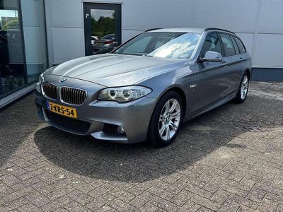 Grijs, metallic lak Gebruikt 2013 BMW 520 M Sport Stationwagen | € 8.900 (Goede deal)