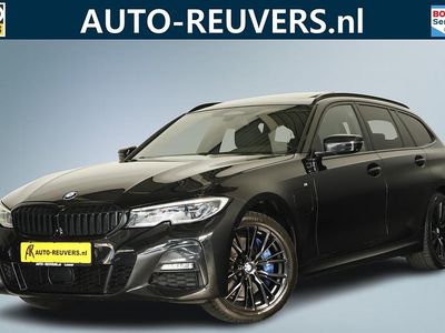 Zwart (metallic) Occasion 2021 BMW 330e M Sport Stationwagen | € 32.900 (Eerlijke prijs)