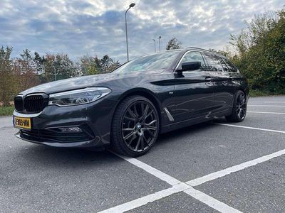 Grijs Occasion 2017 BMW 520 Executive Stationwagen | € 34.995