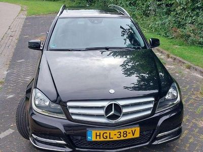 Zwart Occasion 2011 Mercedes C180 Stationwagen | € 10.500 (Iets duurder)