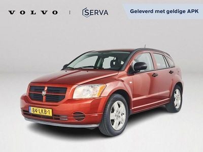 Oranje Gebruikt 2010 Dodge Caliber Hatchback | € 2.750 (Eerlijke prijs)