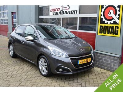 tweedehands Peugeot 208 1.2 PureTech Signature O.a: Navi, Carplay, PDC, Ai