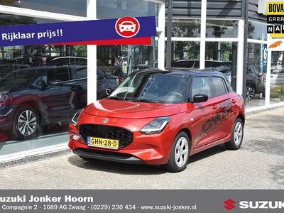 Rood Occasion 2024 Suzuki Swift Hatchback | € 22.944 (Eerlijke prijs)
