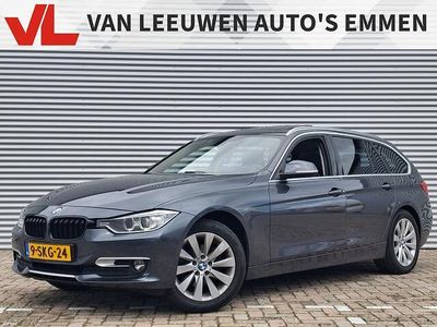Grijs, metallic lak Gebruikt 2013 BMW 318 Executive Stationwagen | € 10.900 (Iets duurder)