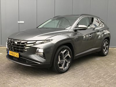 tweedehands Hyundai Tucson 1.6 T-GDI 265pk PHEV Premium 4WD Automaat | Leder | Keyless | Full - Led | Navigatie | Afn. Trekhaak | 360 Camera | 19" Lichtmet