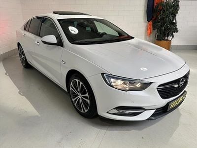 Wit (metallic) Gebruikt 2019 Opel Insignia Sport Hatchback | € 13.950 (Eerlijke prijs)