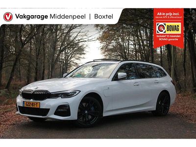 Wit Occasion 2020 BMW 330 Executive Stationwagen | € 29.550 (Iets duurder)