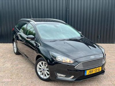 Zwart, metallic lak Occasion 2015 Ford Focus Titanium Stationwagen | € 6.950 (Goede deal)