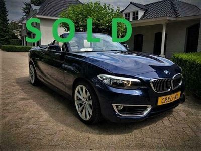 tweedehands BMW 218 Cabrio Automaat Luxury Navigatie blauwmet 18" velg