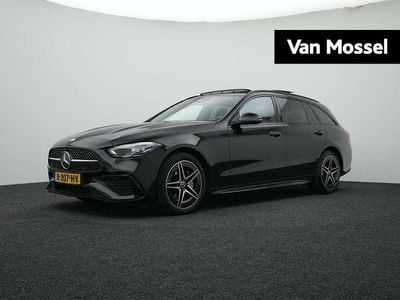 Zwart Occasion 2022 Mercedes C300e AMG line Stationwagen | € 33.900 (Eerlijke prijs)
