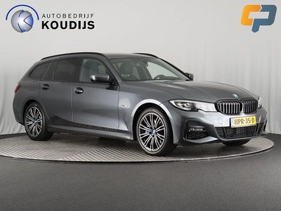 Grijs Gebruikt 2022 BMW 330e M Sport Stationwagen | € 31.650 (Goede deal)