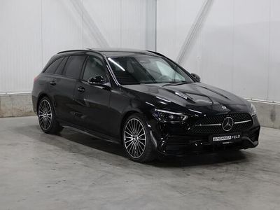 Zwart Gebruikt 2024 Mercedes C220 AMG line Stationwagen | € 59.995