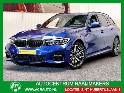 Blauw Occasion 2022 BMW 330e Executive Stationwagen | € 32.935 (Super prijs)