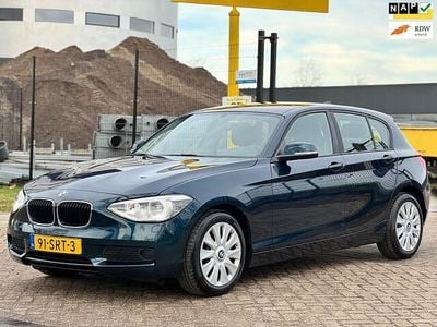Blauw (metallic) Gebruikt 2011 BMW 116 Hatchback | € 5.750 (Eerlijke prijs)