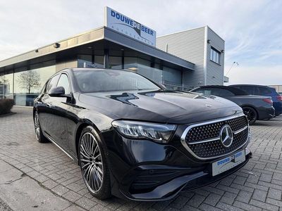 Zwart (metallic) Occasion 2024 Mercedes E300 AMG line Stationwagen | € 59.950 (Eerlijke prijs)