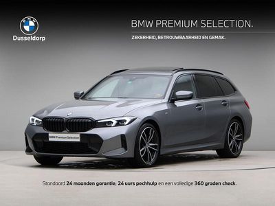 Skyscraper grey metallic (grijs metallic) Gebruikt 2024 BMW 318 Shadowline Stationwagen | € 43.950 (Duur)