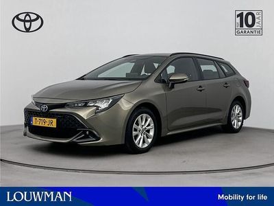 Groen metallic Occasion 2023 Toyota Corolla Active Stationwagen | € 23.485 (Eerlijke prijs)
