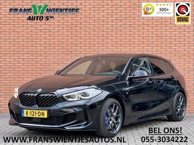 tweedehands BMW M135 1-SERIE i xDrive High Executive | 306 PK! | M Sport | Alcantara | Head-Up Display | Keyless Go | Trekhaak | Led | Navigatie | 18" Lichtmetaal | DAB | Lane Assist |