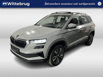 Grijs (metallic) Gebruikt 2022 Skoda Karoq Ambition SUV | € 26.950 (Duur)