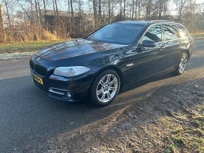 Zwart Occasion 2014 BMW 530 Executive Stationwagen | € 9.950 (Goede deal)