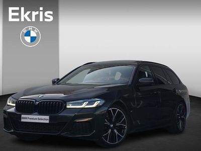 Grijs Occasion 2022 BMW 520 Executive Stationwagen | € 42.900 (Duur)