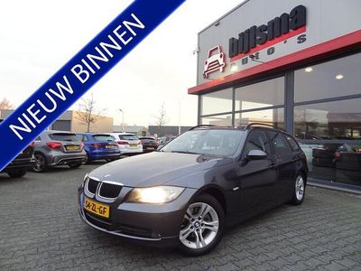 Grijs (metallic) Occasion 2007 BMW 320 Executive Stationwagen | € 8.999