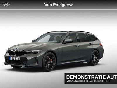 Bmw individual dravitgrau (donker grijs) Occasion 2025 BMW 330e M Sport Stationwagen | € 76.571