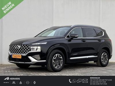 tweedehands Hyundai Santa Fe 1.6 T-GDI HEV Comfort Smart 7p. Automaat / Zeven persoons / Elektrische stoelen / Trekgewicht 1.650kg! /